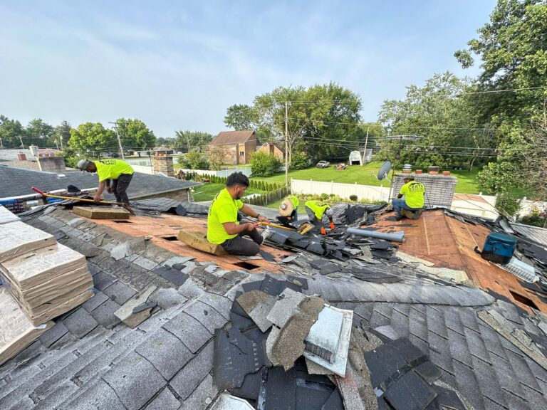 Roofing team installing