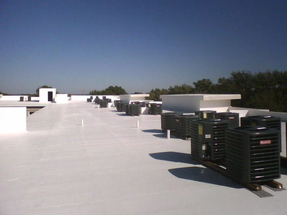 Certa Roofing white elastomeric roof coating installation